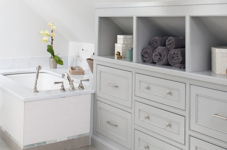 Dark gray towels in a chest of drawers