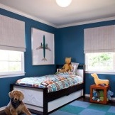The combination of shades of blue in the nursery