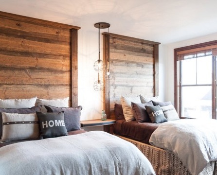 Two beds with wooden headboards