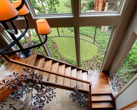 Wooden staircase near the panoramic window