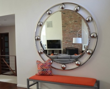 Mirror in a metal frame with balls