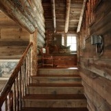 Wooden staircase in the color of the walls