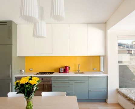 Yellow color in the interior of the kitchen