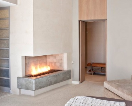 Corner fireplace with gray stand
