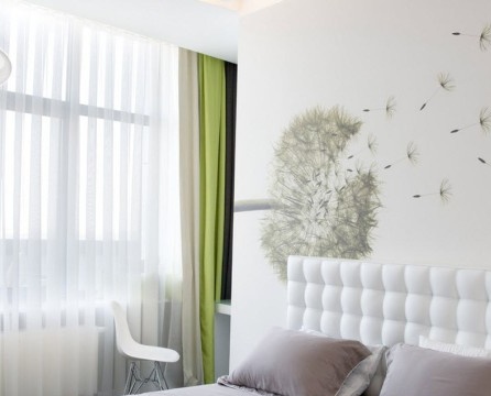 A large image of a dandelion in the bedroom
