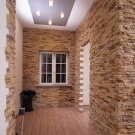 Decorating the walls of the hallway with decorative stone