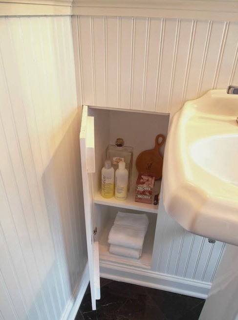 Built-in wall furniture in a small bathroom