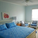 Red color in the interior of a blue bedroom