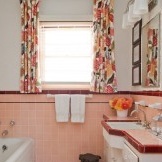 Lush bathroom interior in peach color