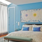 Bright accents in the blue bedroom
