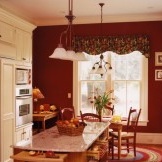 Red color in the interior of the kitchen