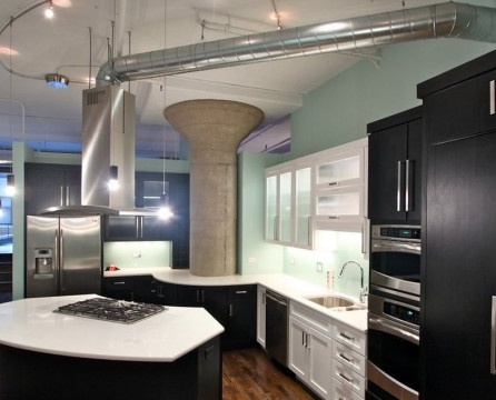 Dark kitchen with an admixture of dark green and pale blue