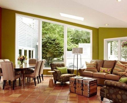 Olive walls and different color furniture