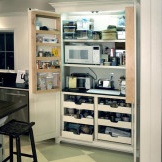 Cabinet for storage of household appliances