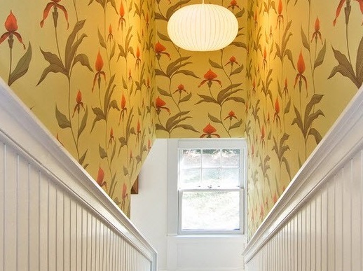 Colored wallpaper over the stairs