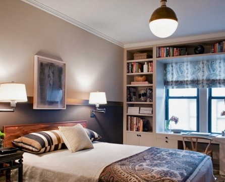 The bedroom is characterized by multi-level lighting