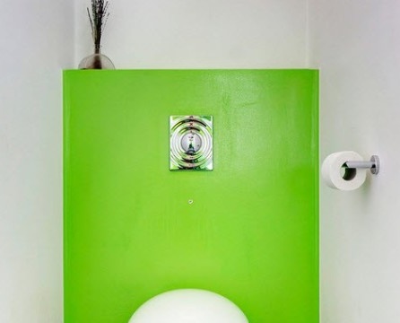 Fluorescent green panel covering the plumbing installation area