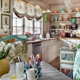 A lot of bright decor items in a small country kitchen