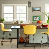 Yellow armchairs in the dining area