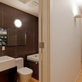 Brown and white bathroom design