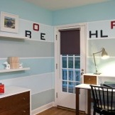 Bright horizontal wide stripes in the interior of the room for a boy