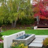 Waterfall gives a more attractive look to your yard.