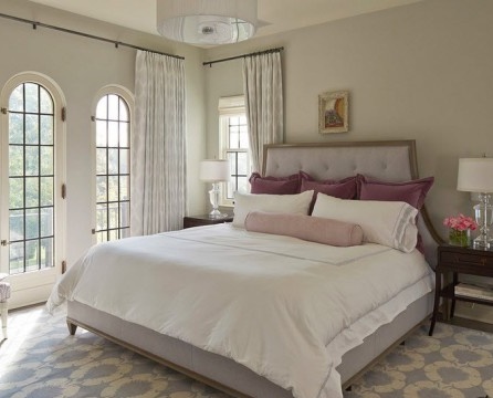 Cherry and pale lilac accents in the bedroom interior