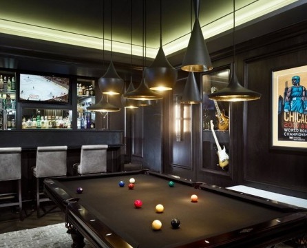 Stylized billiard room with a dark finish