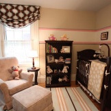 Striped rug in the nursery