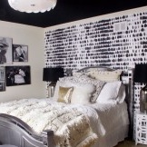 The black ceiling blends in well with the black and white wall patches.