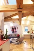 Attic apartment with ceiling beams