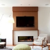 Obývací pokoj s krbem v moderním stylu