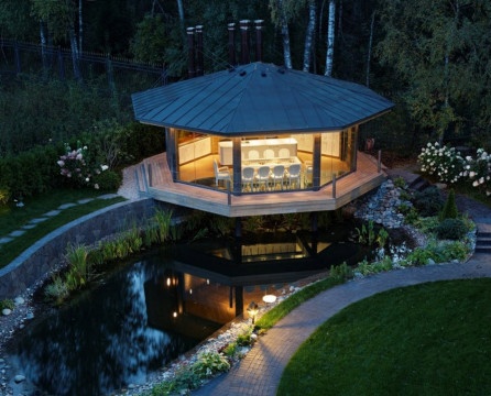 Brightly lit cabin over the lake