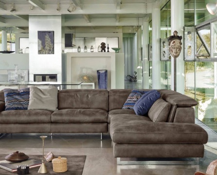 Corner sofa in the interior of a modern living room