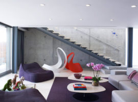 Sala de estar estilo moderno com móveis sem moldura