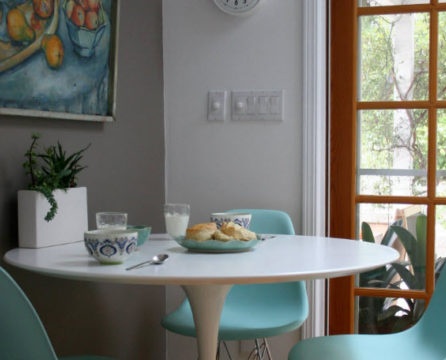 Compact dining table and designer chairs