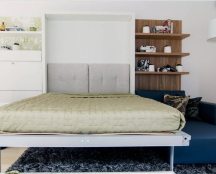 Vertical folding bed