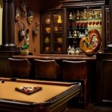 Pool table in front of the bar