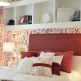 White wallpaper with red letters.