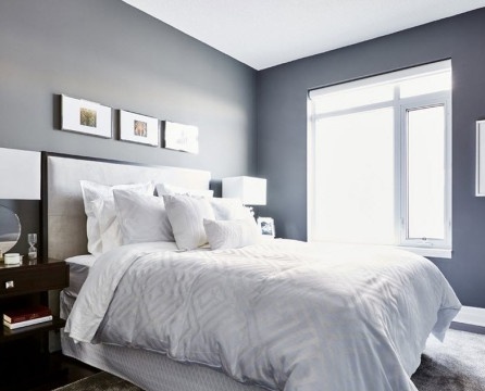 Decoración de dormitorio en tonos grises.