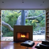 Fireplace by the glass wall