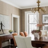 Orange armchairs in the dining room