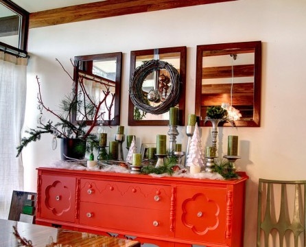 Wreath of vines over a red chest of drawers