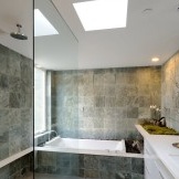 Gray tiles on the walls of the bathroom
