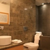 Combination of gray tiles with snow-white sanitary ware