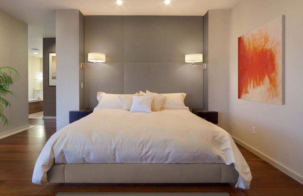 Bedroom with wall bedside lamps