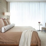 Beige bedspread and pillows