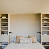 Shelving in the bedroom: convenience, practicality, functionality
