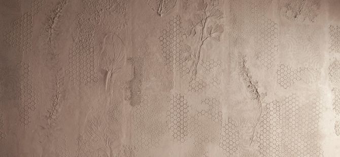 Decorative plaster of ordinary putty: methods of implementation and advantages