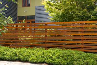 Design of a fence for a suburban area: a new life of building materials (44 photos)